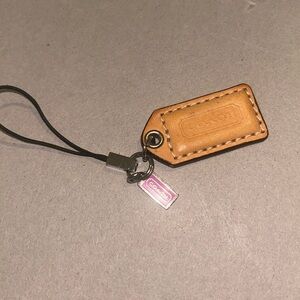 Coach bag tag